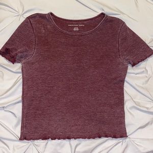 Maroon colored crop top from American Eagle and is a size small.